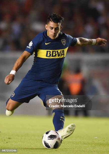 Cristian Pavon of Boca Juniors kicks the ball during a match between Independiente and Boca Juniors as part of Superliga 2017/18 on April 15, 2018 in...