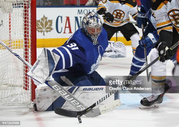 Frederik Andersen of the Toronto Maple Leafs turns a shot away against the Boston Bruins in Game Three of the Eastern Conference First Round during...