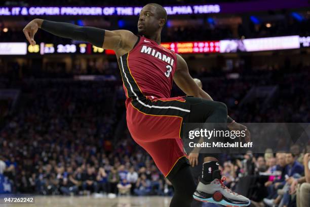 Dwyane Wade of the Miami Heat watches his shot in the third quarter against the Philadelphia 76ers during Game Two of the first round of the 2018 NBA...