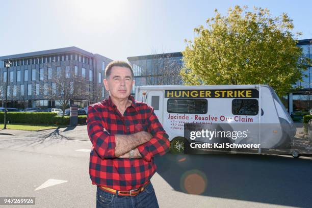 Peter Glasson stands outside the Southern Response office on April 17, 2018 in Christchurch, New Zealand. Glasson started his hunger strike to...