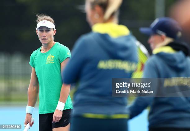 Samantha Stosur of Australia watches on at practice after a media opportunity ahead of the Australia v Netherlands Fed Cup World Group Play-off at...