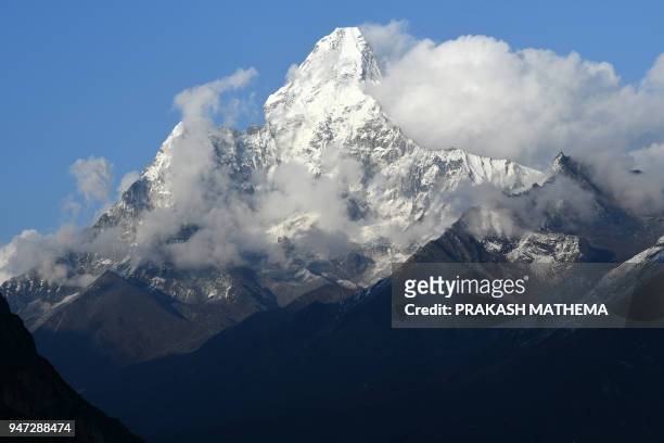 This photo taken on April 16, 2018 shows the Himalayan mountain Mount Ama Dablam from Khumjung village in the Everest region, some 140km northeast of...