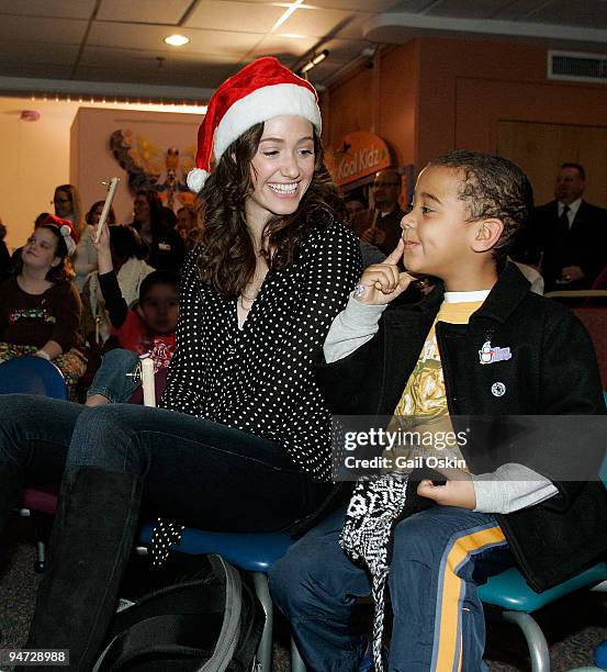 Emmy Rossum performs during a special holiday performance at the Children's Hospital Boston on December 17, 2009 in Boston, Massachusetts.