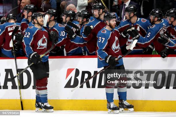 Coilin Wilson and J.T. Compher of the Colorado Rockies celebrate their third goal against the Nashville Predators in Game Three of the Western...