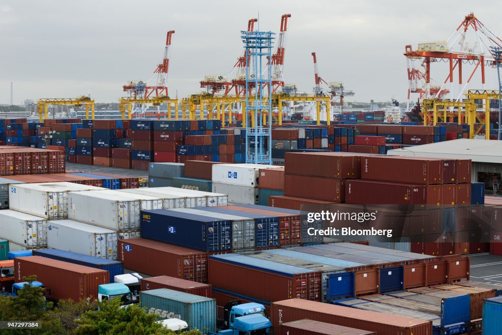 Japanese Container Line Containers sit stacked at a shipping terminal in Yokohama, Japan, on ...