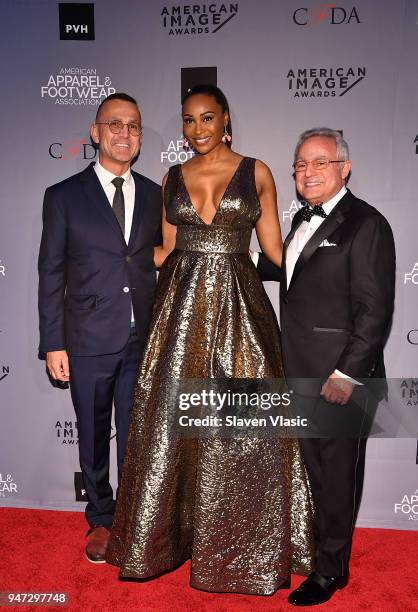 Steven Kolb, President and CEO, CFDA, actor Cynthia Bailey and Rick Helfenbein, President and CEO, AAFA attend American Apparel & Footwear...