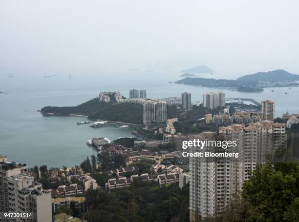 Apartment buildings and low-rise units stand in Discovery Bay, a residential project developed by Hong Kong Resort Co., on Lantau Island in Hong...