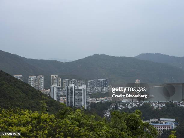 Apartment buildings and low-rise units stand in Discovery Bay, a residential project developed by Hong Kong Resort Co., on Lantau Island in Hong...