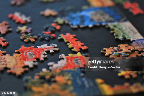 paperboard jigsaw puzzle pieces - simplify complexity stock pictures, royalty-free photos & images