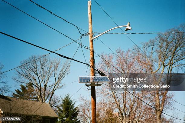 Utility pole solar panel in a suburban neighborhood in Westfield, New Jersey, manufactured by Petra Solar and part of the large scale Solar 4 All...