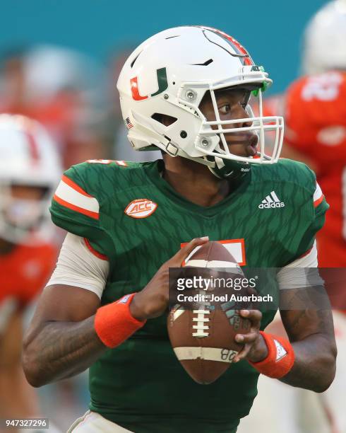 Kosi Perry of the Miami Hurricanes runs out of the pocket with the ball during the spring game on April 14, 2018 at Hard Rock Stadium in Miami...