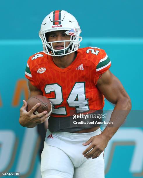 Travis Homer of the Miami Hurricanes runs with the ball prior to the spring game on April 14, 2018 at Hard Rock Stadium in Miami Gardens, Florida....
