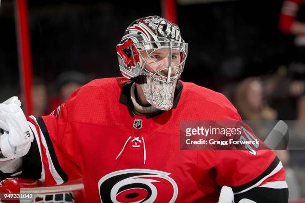Cam Ward of the Carolina Hurricanes slates out of the crease during a timeout of a game against the Tampa Bay Lightning on April 7, 2018 at PNC Arena...