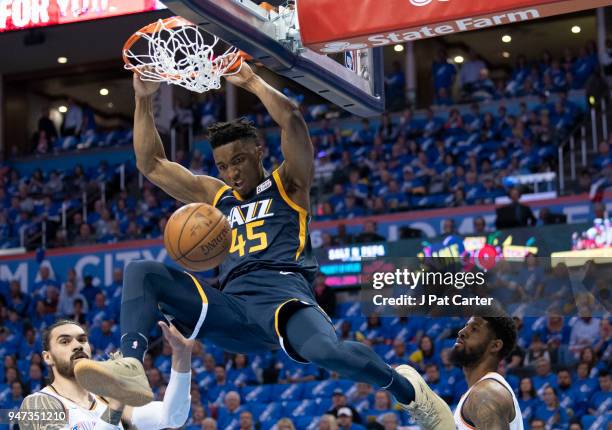 Donovan Mitchell of the Utah Jazz dunks two points against the Oklahoma City Thunder during the first half of a NBA playoff game at the Chesapeake...