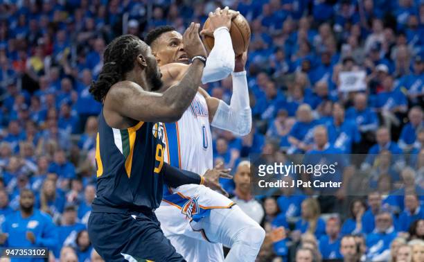 Russell Westbrook of the Oklahoma City Thunder shoots over Jae Crowder of the Utah Jazz during the second half of Game One of the Western Conference...