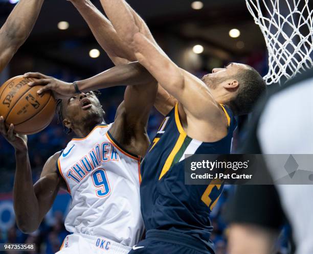 Jerami Grant of the Oklahoma City Thunder shoots over Rudy Gobert of the Utah Jazz during the second half of Game One of the Western Conference in...