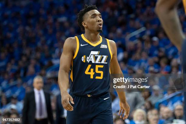 Donovan Mitchell of the Utah Jazz watches game action against the Oklahoma City Thunder during the second half of Game One of the Western Conference...
