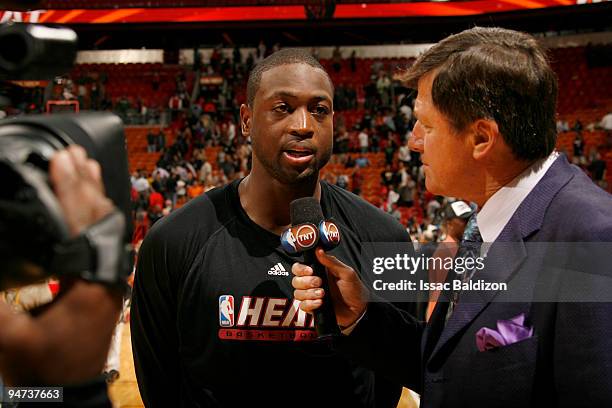 Dwyane Wade of the Miami Heat is interviewed by Craig Sager on December 17, 2009 at American Airlines Arena in Miami, Florida. NOTE TO USER: User...