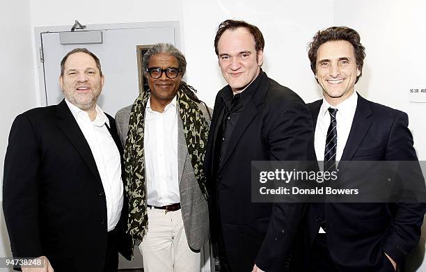 Producer Harvey Weinstein, film critic Elvis Mitchell, director Quentin Tarantino and producer Lawrence Bender attend a screening of "Inglourious...