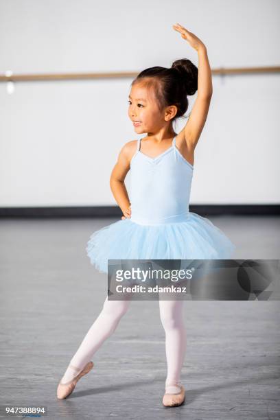 ballerina practicing in dance studio - ballet girl stock pictures, royalty-free photos & images