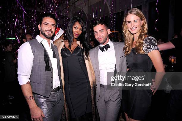 Lorenzo Martone, Jessica White, Ryan Brown and Julie Henderson attend the Chandelier Creative & Commonwealth Utilities Celebrate Christmas...