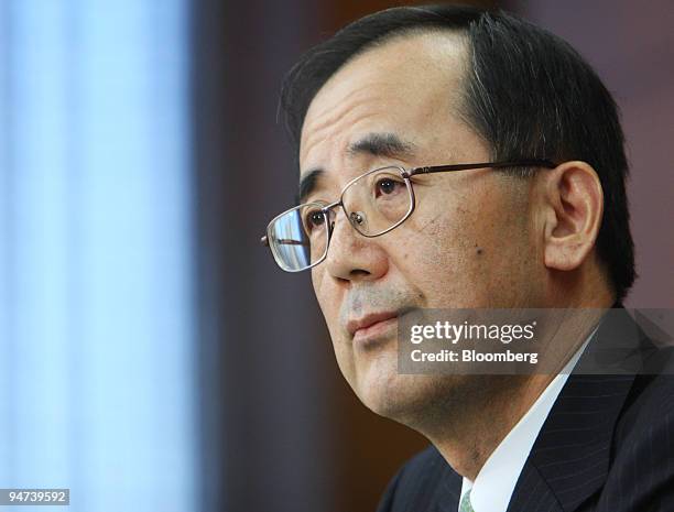 Masaaki Shirakawa, governor of the Bank of Japan, listens during a news conference at the central bank's headquarters in Tokyo, Japan, on Friday,...