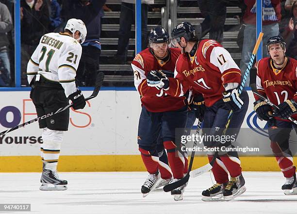 Maxim Afinogenov of the Atlanta Thrashers celebrates with Ilya Kovalchuk after scoring against the Dallas Stars at Philips Arena on December 17, 2009...