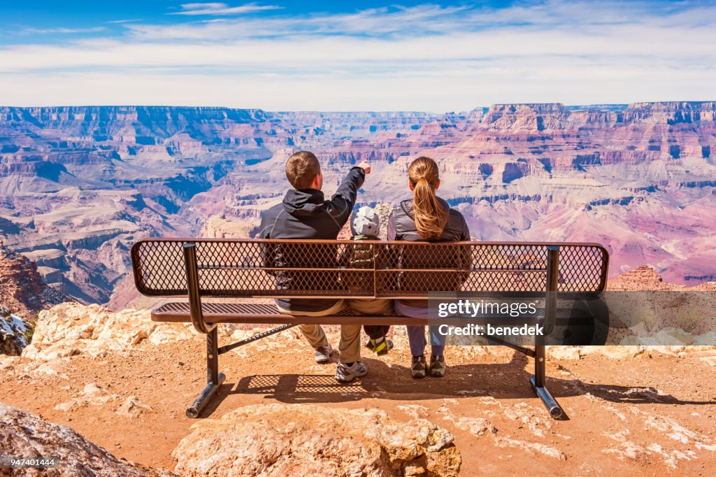 Family looking at view Grand Canyon National Park USA