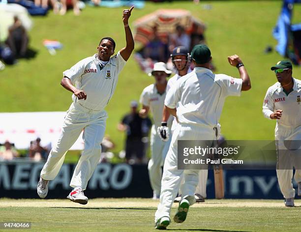Makhaya Ntini of South Africa celebrates with his team mates after taking the wicket of Andrew Strauss of England for 46 runs during day three of the...