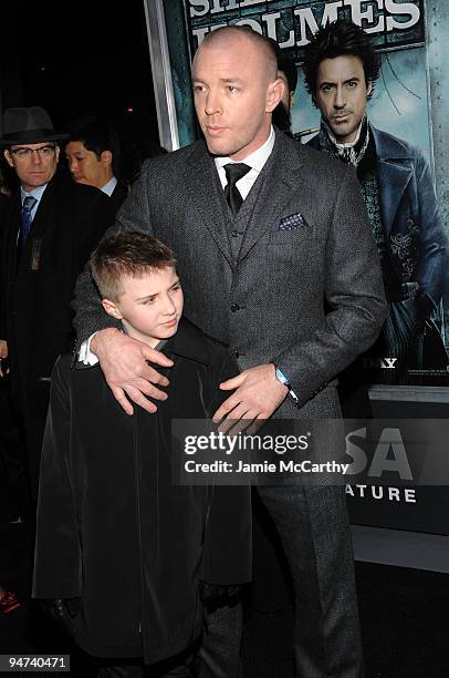 Rocco Ritchie and director Guy Ritchie attend the premiere of "Sherlock Holmes" at the Alice Tully Hall, Lincoln Center on December 17, 2009 in New...