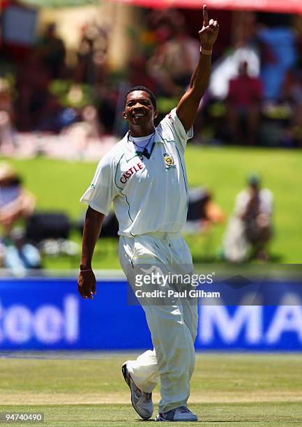 Makhaya Ntini of South Africa celebrates taking the wicket of Andrew Strauss of England for 46 runs during day three of the first test match between...