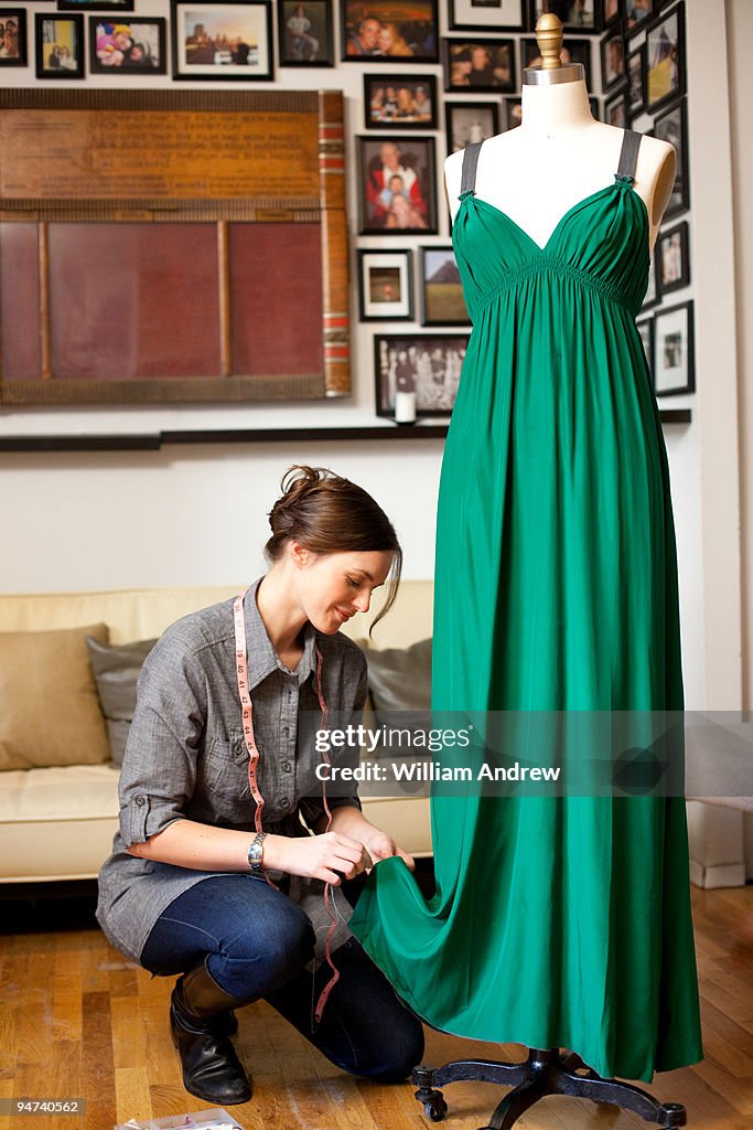 Seamstress hemming dress