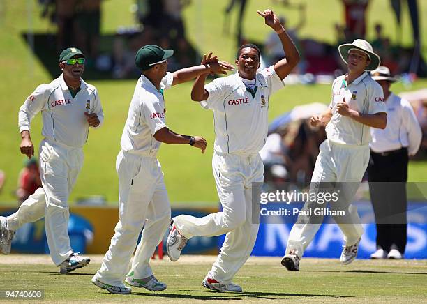 Makhaya Ntini of South Africa celebrates taking the wicket of Andrew Strauss of England for 46 runs during day three of the first test match between...