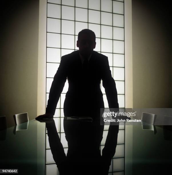 business man or boss in silhouette interview - contour stock pictures, royalty-free photos & images