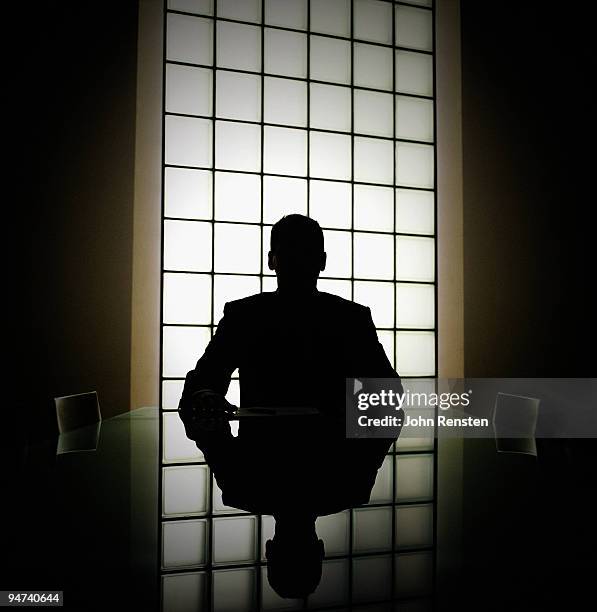 business man or boss in silhouette interview - silhouet man stockfoto's en -beelden