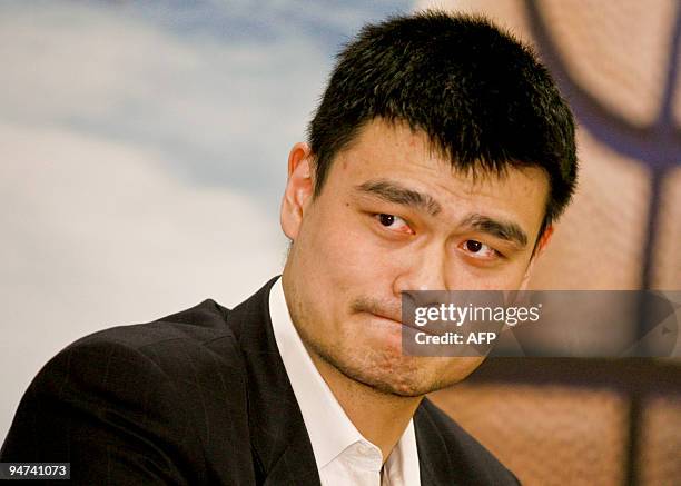 Houston Rockets basketball player Yao Ming appears at a press conference for his CBA club, the Shanghai Sharks, in Shanghai on December 18, 2009....