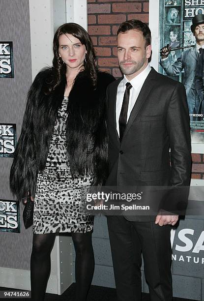 Model Michelle Hicks and actor Jonny Lee Miller attend the New York premiere of "Sherlock Holmes" at the Alice Tully Hall, Lincoln Center on December...