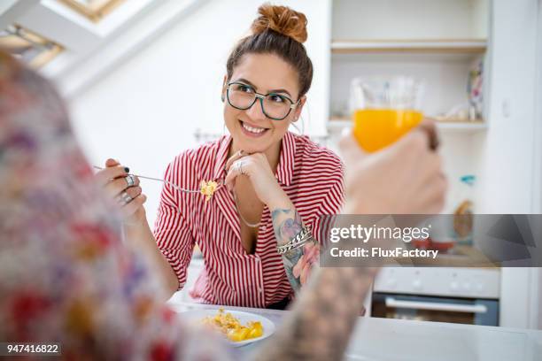 eating together in the morning - scrambled eggs stock pictures, royalty-free photos & images