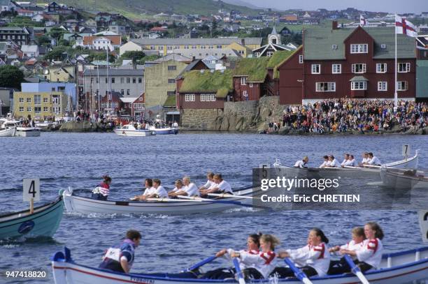 Saint-Olaf , la fete nationale des feroiens. L'incoutournable course de bateau traditionnel feroien ou chaque equipage represente l'ile ou il habite.