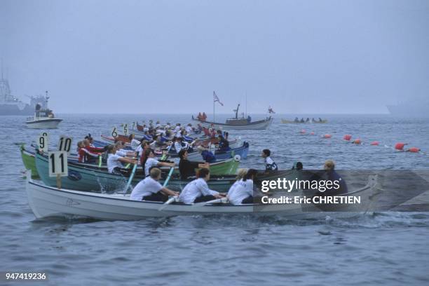 Saint-Olaf , la fete nationale des feroiens. L'incoutournable course de bateau traditionnel feroien ou chaque equipage represente l'ile ou il habite.