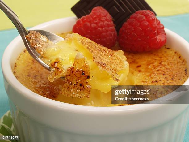 bite of brulee - creme brulee stock pictures, royalty-free photos & images