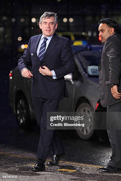 Gordon Brown, U.K. Prime minister, left, arrives for meetings on the final day of the COP15 United Nations Climate Change Conference at the Bella...