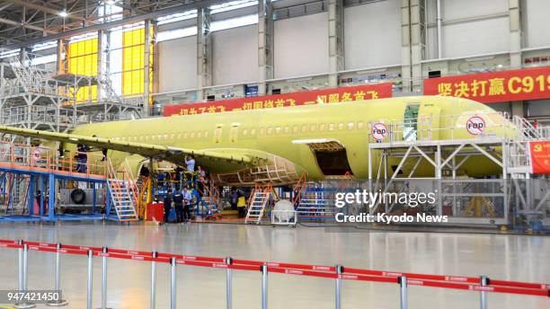 Photo taken on May 4 shows a second unit of the C919, China's first domestically built jetliner, under construction at a factory operated by...