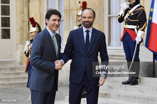 French Prime Minister Edouard Philippe welcomes Canadian Prime Minister Justin Trudeau for a meeting at Hotel de Matignon on April 17, 2018 in Paris,...