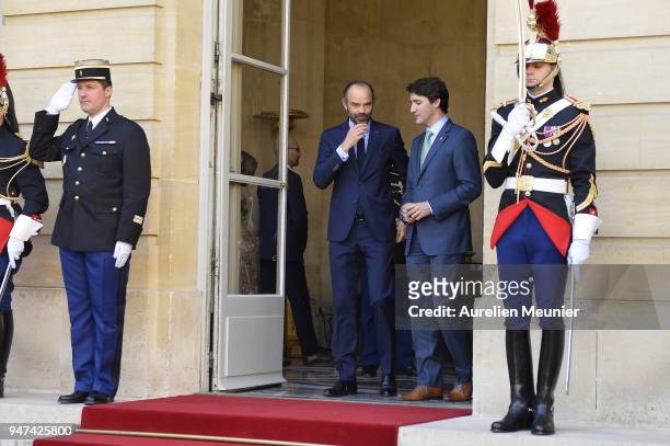 French Prime Minister Edouard Philippe escorts Canadian Prime Minister Justin Trudeau after a meeting at Hotel de Matignon on April 17, 2018 in...