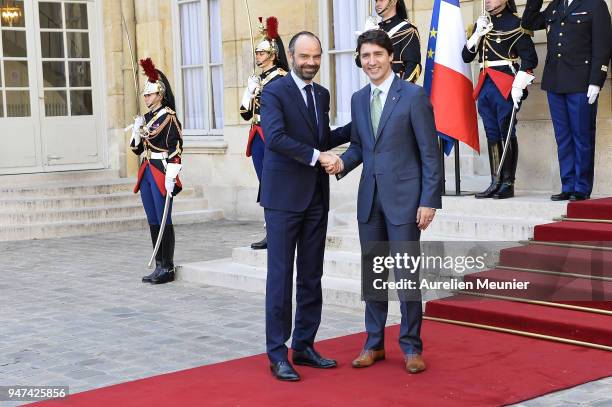 French Prime Minister Edouard Philippe welcomes Canadian Prime Minister Justin Trudeau for a meeting at Hotel de Matignon on April 17, 2018 in Paris,...