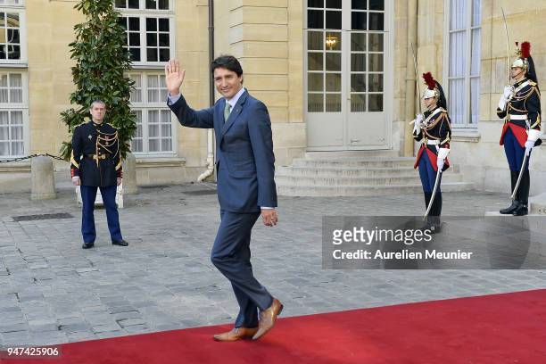 Canadian Prime Minister Justin Trudeau leaves after a meeting with French Prime Minister Edouard Philippe at Hotel de Matignon on April 17, 2018 in...