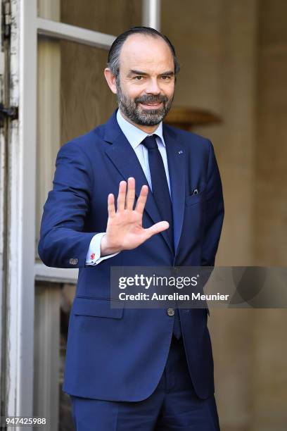 French Prime Minister Edouard Philippe waits for Canadian Prime Minister Justin Trudeau for a meeting at Hotel de Matignon on April 17, 2018 in...