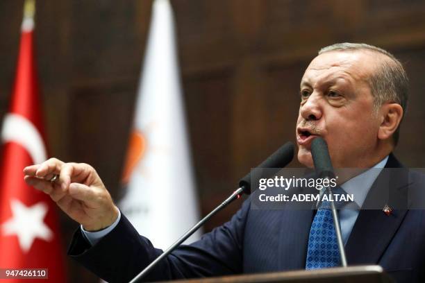 President of Turkey and Leader of the Justice and Development Party , Recep Tayyip Erdogan, gestures as he gives a speech during an AK party's...