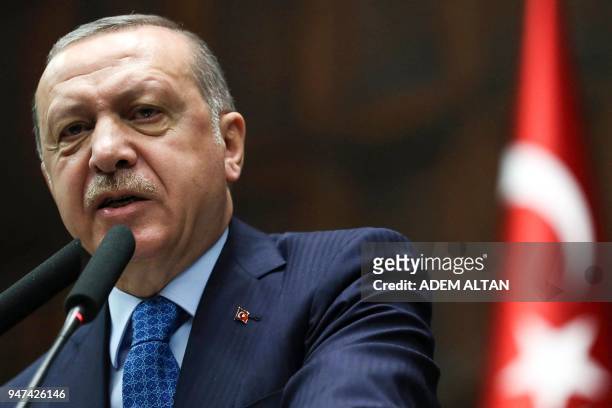 President of Turkey and Leader of the Justice and Development Party , Recep Tayyip Erdogan, gestures as he gives a speech during an AK party's...